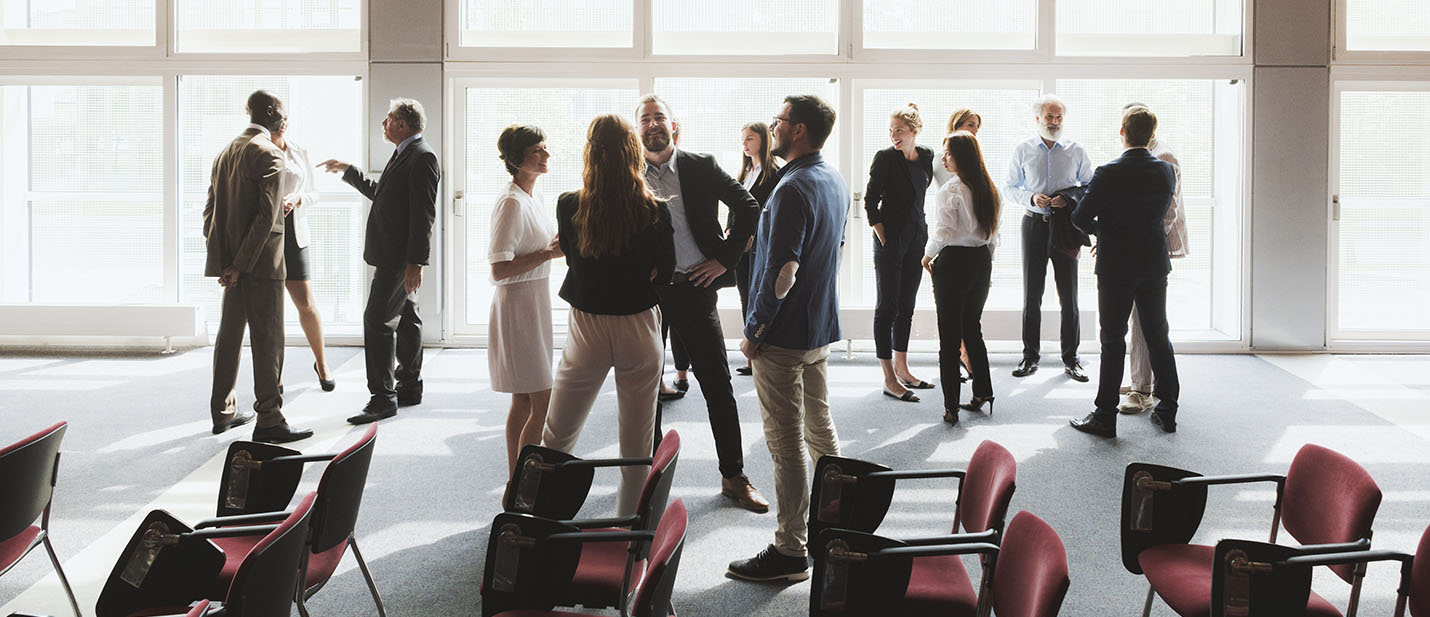 Group of business people in the convention center.